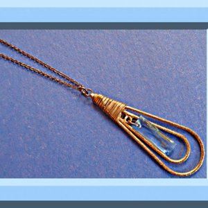 Antique Gold Tear Drop Design Necklace With Blue Crystal Gold Tone Finish